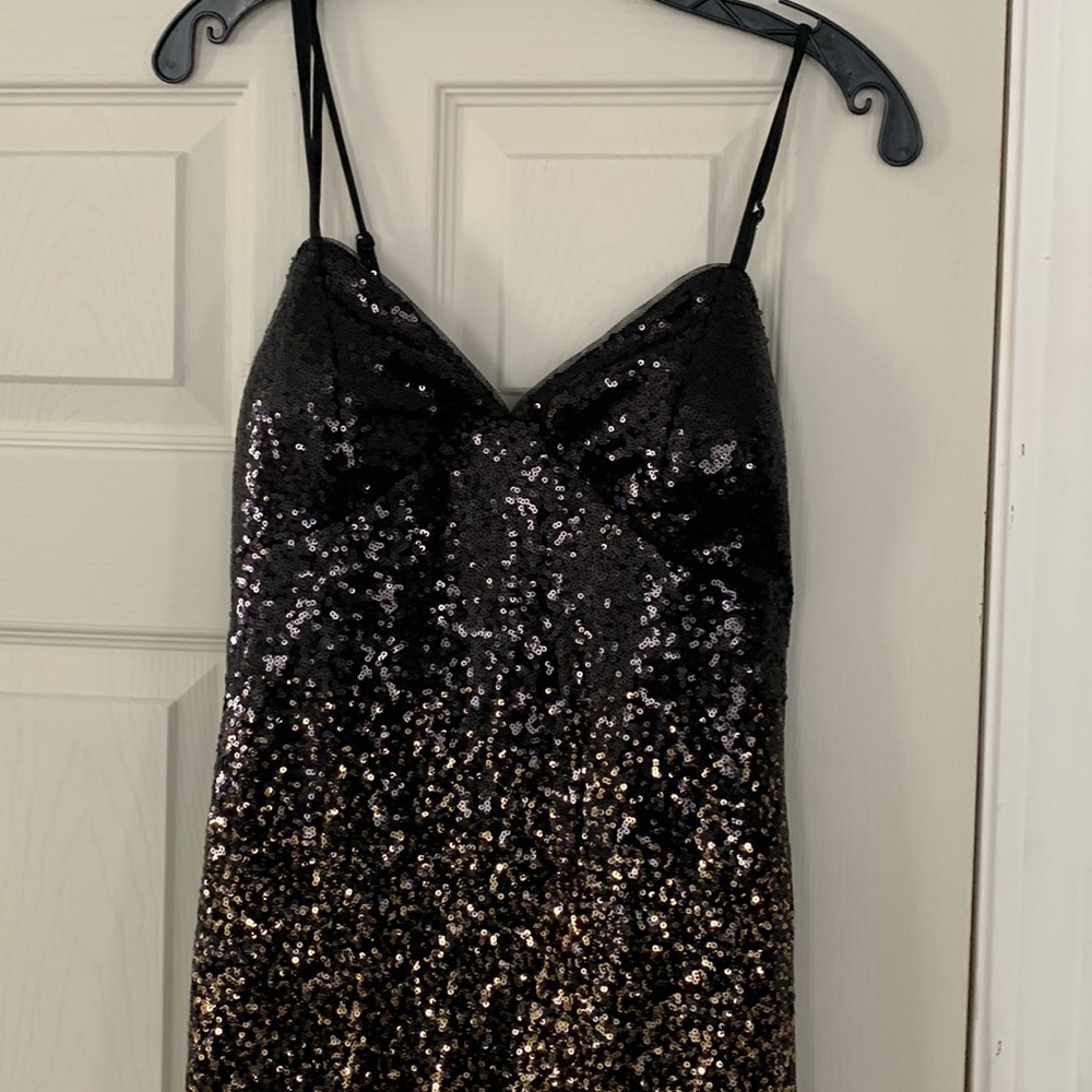 Stunning Black and Gold sequined scrappy ball gown.